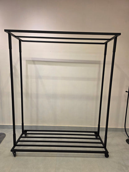 Long iron stand for hanging clothes